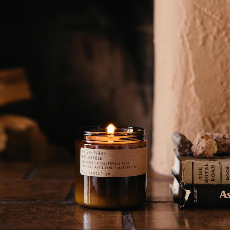 P.F. Candle Co. EU Piñon Large Candle - Winters in the Southwest, lingering bonfires, wool jackets in rotation. Pinon logs, cedar, and vanilla.