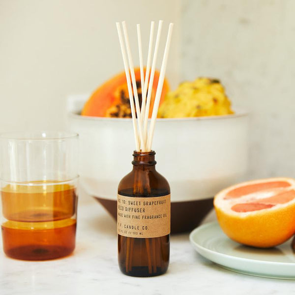 P.F. Candle Co. EU Sweet Grapefruit Reed Diffuser - Lifestyle - Ice cold lemonade. Dinner on the patio with your favorite people. Grapefruit, yuzu, and lemon
