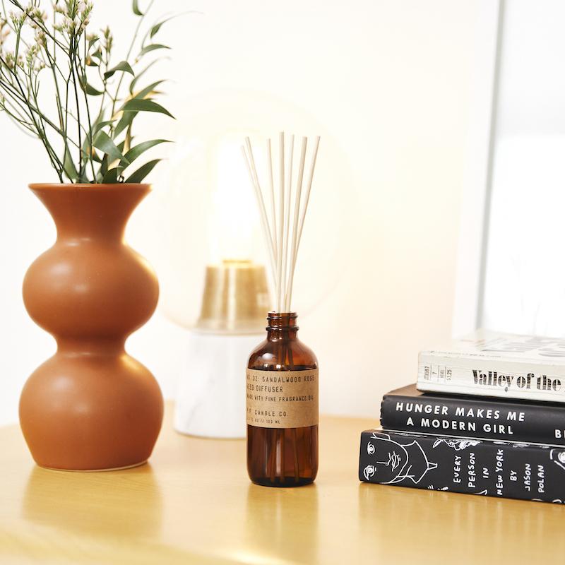 P.F. Candle Co. EU - Sandalwood Rose Classic 3.5 fl oz Reed Diffuser - Lifestyle - New York meets Los Angeles. Cashmere rose, oud, and sandalwood.