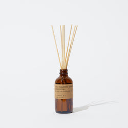 P.F. Candle Co. EU - Teakwood & Tobacco Classic 3.5 fl oz Scented Reed Diffuser - Product - Packaged in apothecary-inspired amber glass bottles with our signature kraft label and rattan reeds. Low-maintenance scent throw, all day long - no match necessary.
