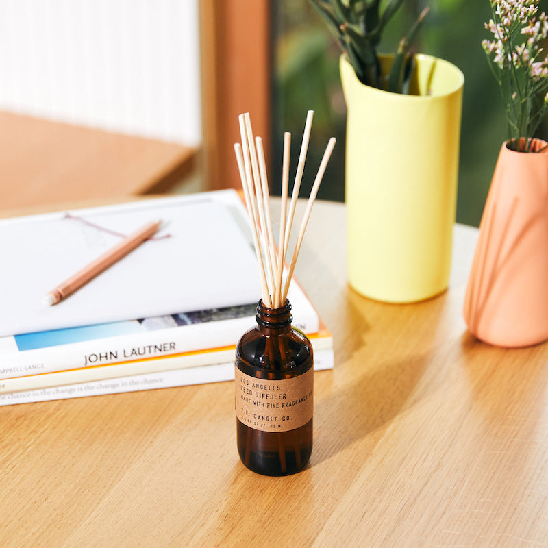 P.F. Candle Co. EU - Los Angeles Classic 3.5 fl oz Reed Diffuser - Lifestyle - Overgrown bougainvillea, canyon hiking, epic sunsets, city lights. Redwood, lime, jasmine, and yarrow.