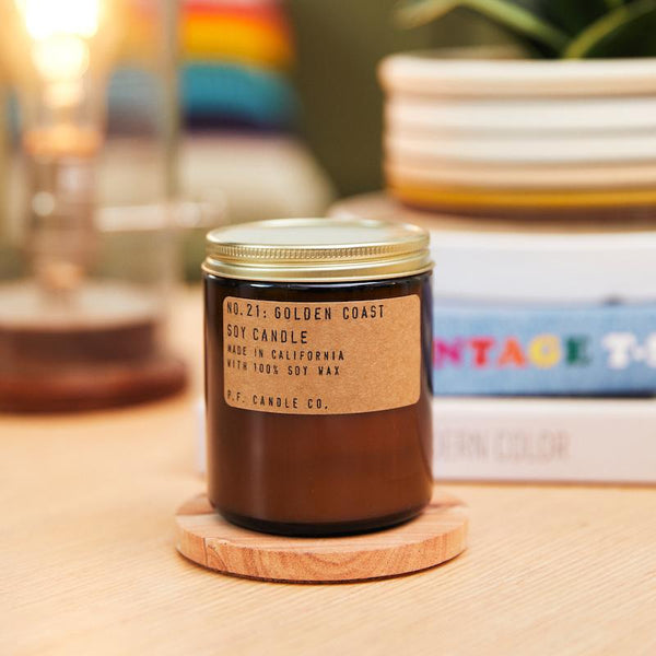 P.F. Candle Co. EU Golden Coast Standard Candle - Lifestyle - Big Sur magic, wild sage baking in the sun, the rumble of waves and rocks. Eucalyptus, sea salt, redwood, and palo santo.
