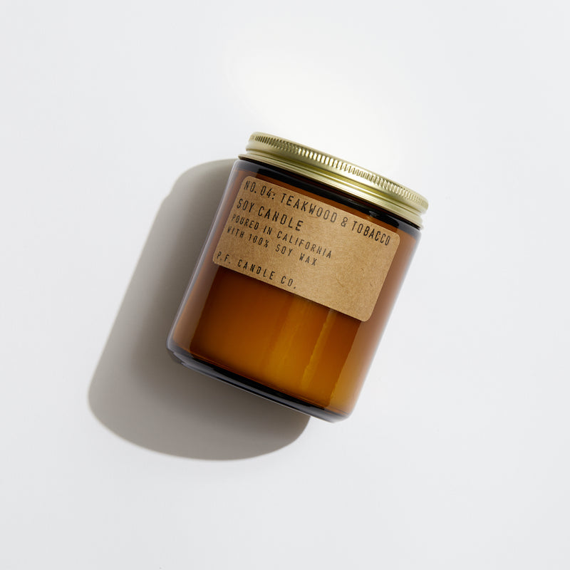 P.F. Candle Co. EU - Teakwood & Tobacco Classic 7.2 oz Standard Scented Soy Wax Candle - Product - Hand-poured into apothecary inspired amber jars with our signature kraft label and a brass lid.