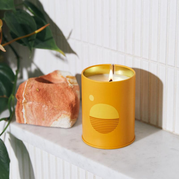 P.F. Candle Co. EU - Golden Hour Sunset 10 oz Scented Soy Wax Candle - Lifestyle - 5pm. Rustling grasses, baked earth, sun rays split between trees. Mellow, dry, tranquil. Bergamot, hay, and golden poppy.