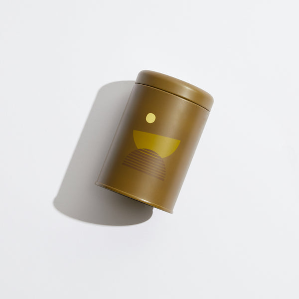 P.F. Candle Co. EU Moonrise Sunset Candle - Product - donned with earth-toned motifs, sun shapes, and horizon lines inspired by California scenery.