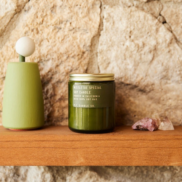 P.F. Candle Co. EU Mistletoe Special Limited Candle - Lifestyle - Festive laughter, twinkling lights, snow gently dancing through the crisp night. Douglas fir, eucalyptus, pine, and cedar.